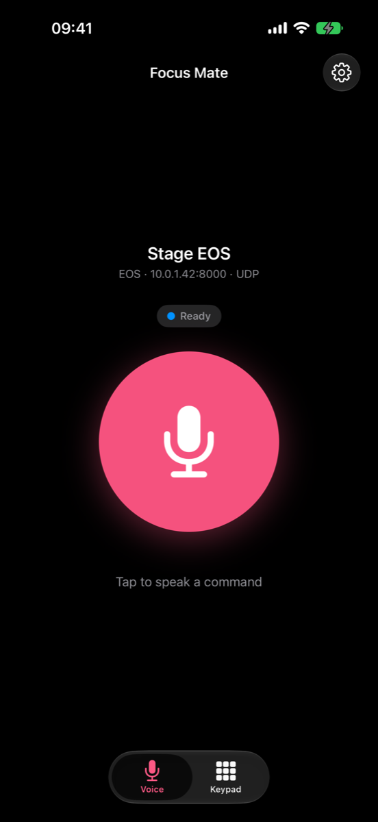 The voice screen: a large microphone button below the name and address of the connected console.